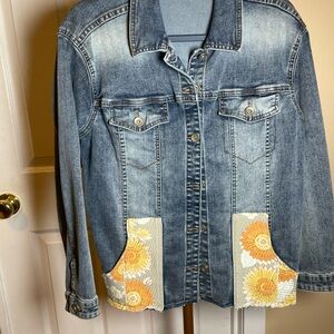 Tribal Blue Denim Jacket with Orange Floral Details sewn on pockets and back.